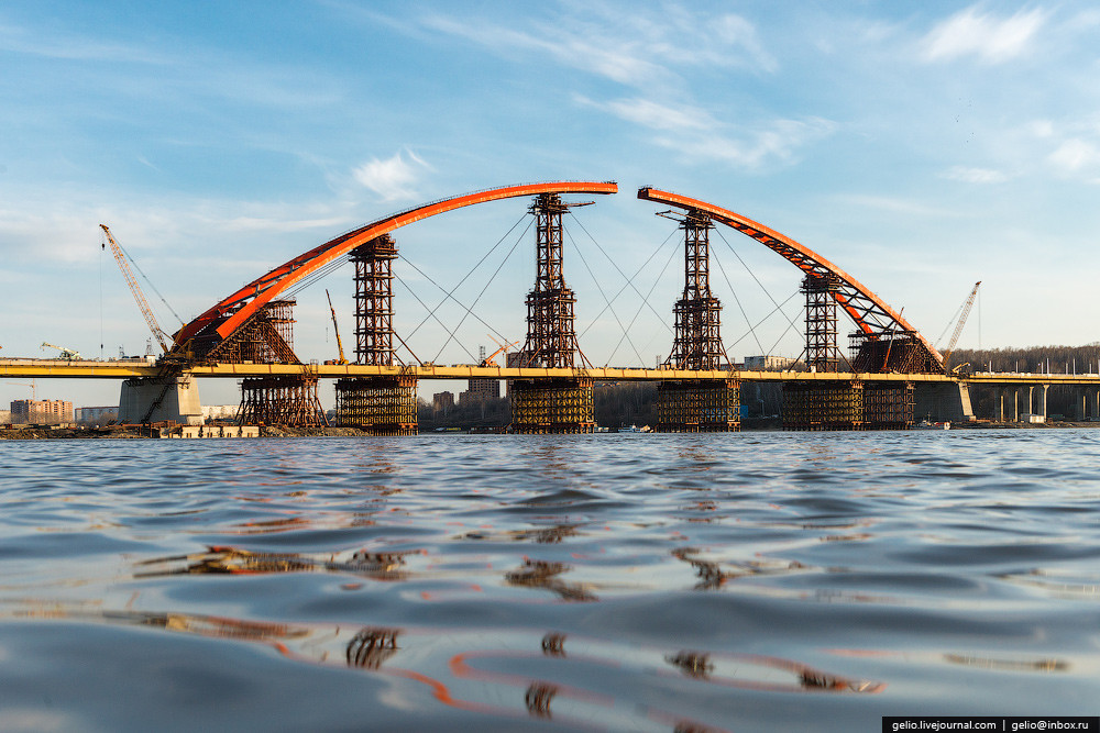 Мост новосибирск. Бугринский мост. Бугринский мост арка. Стройка Бугринского моста. Бугринский мост строительство.