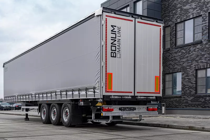 Фото №1 для статьи «Производство: Тентованный полуприцеп для перевозки стали в рулонах»