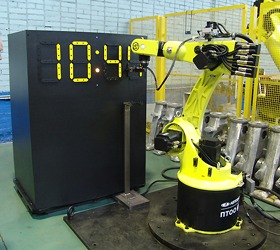 Роботизированный технологический комплекс, разработанный ООО "ВМЗ" выполняет эмуляцию дисплея электронных часов в реальном времени