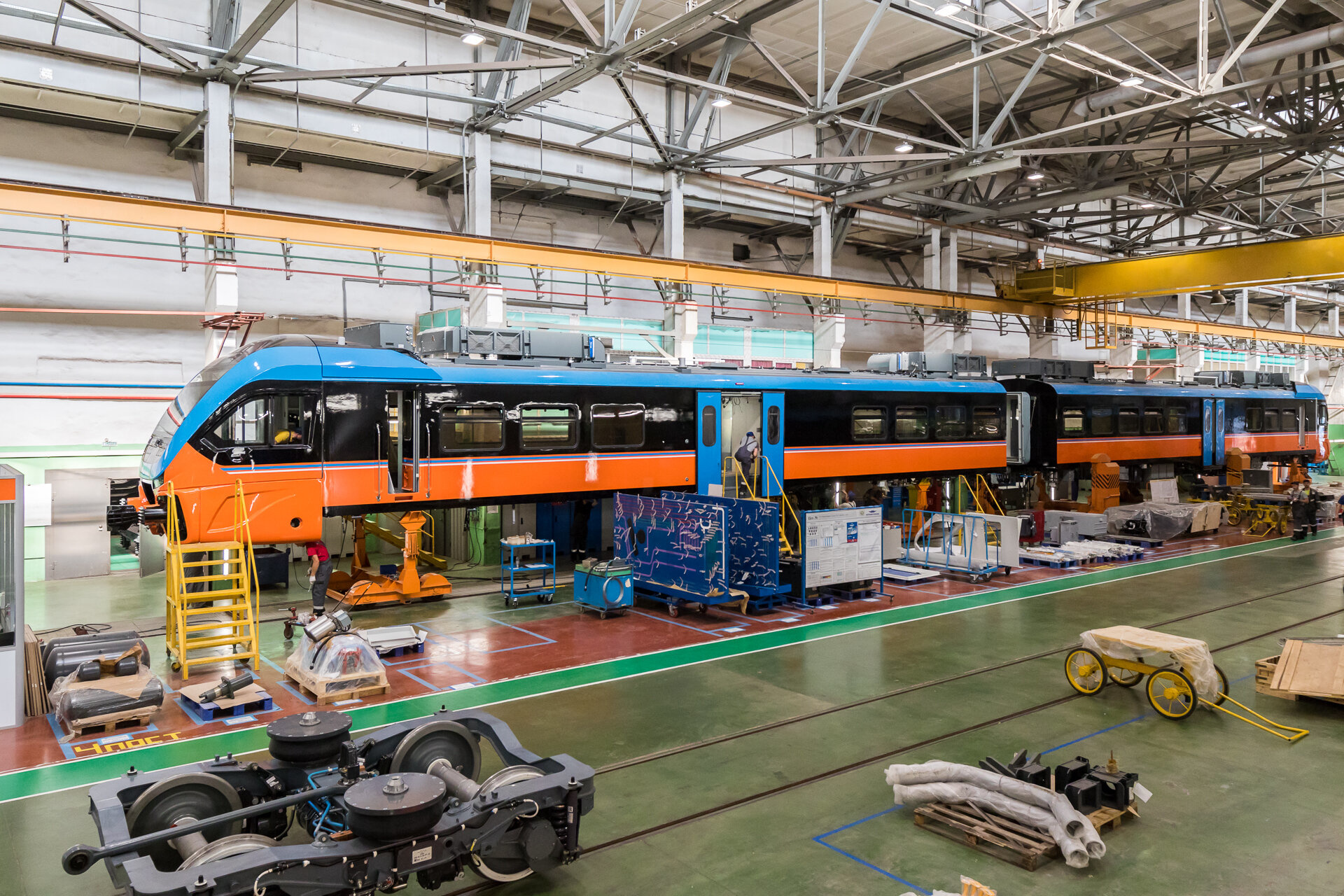 Железнодорожное производство. Рельсовый автобус Метровагонмаш. Вагонный завод Мытищи. Завод метровагонмаш3 ЦЭХ. Железнодорожная промышленность.